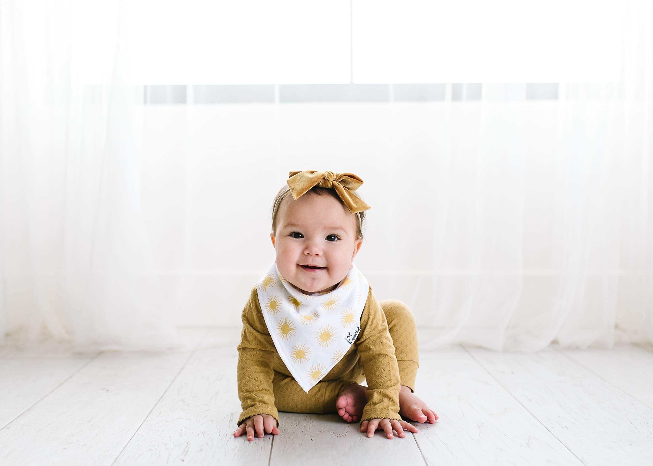 Copper Pearl Sunny Set bibs in daily use during teething and drool moments