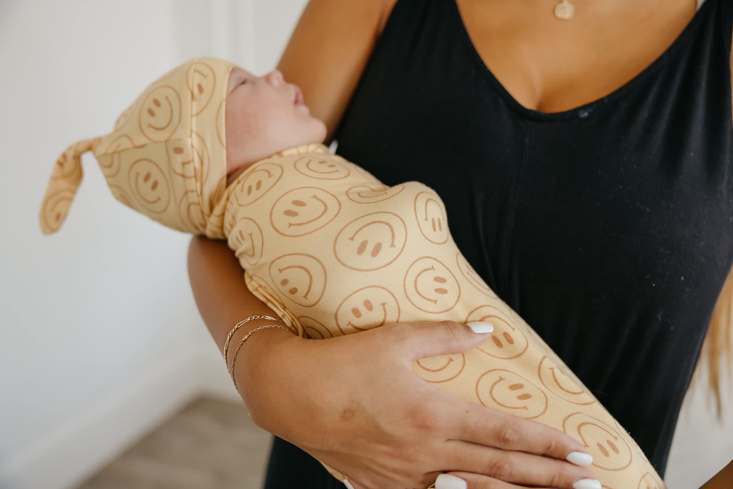 Copper Pearl swaddle blanket used as nursing cover for discreet feeds.