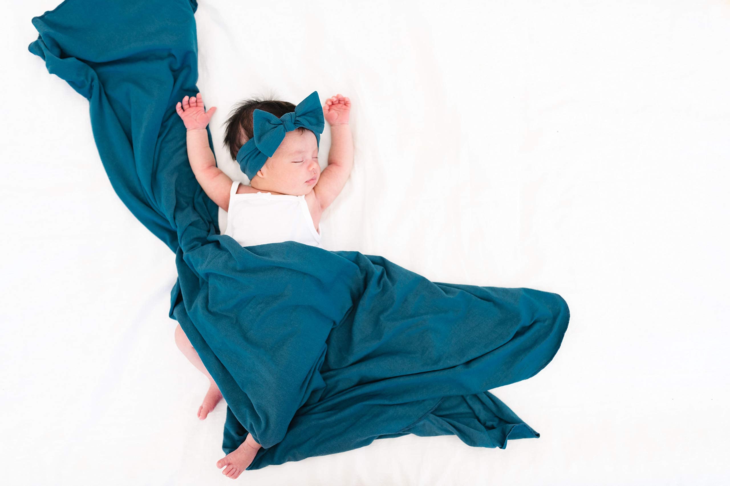 Copper Pearl steel swaddle blanket as stroller shield on sunny day