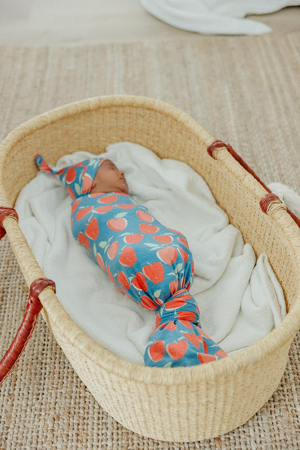 Copper Pearl swaddle blanket stroller shield keeps baby comfortable while on the go
