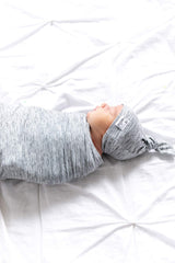 Copper Pearl swaddle blanket trendy print design shown for coordinated baby outfits.
