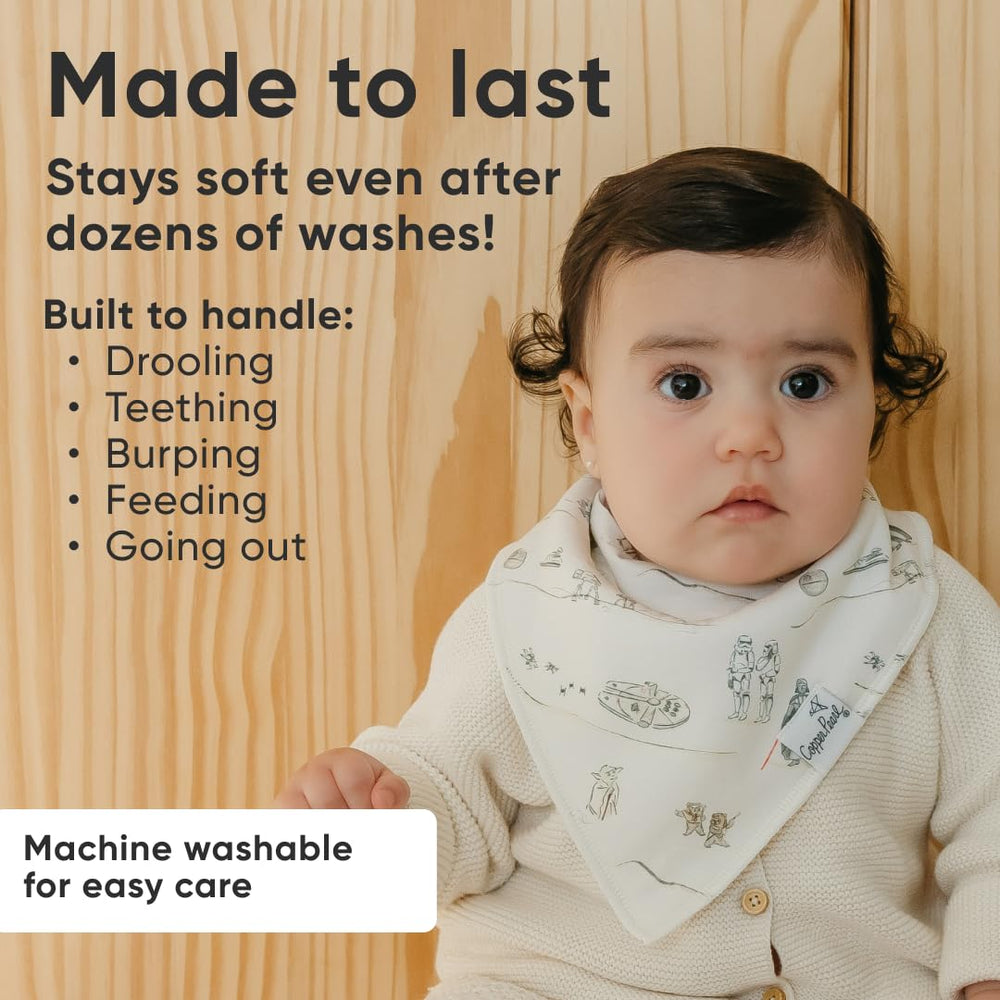 Copper Pearl Tatooine bandana bibs worn by baby demonstrating adjustable fit from 3 to 24 months
