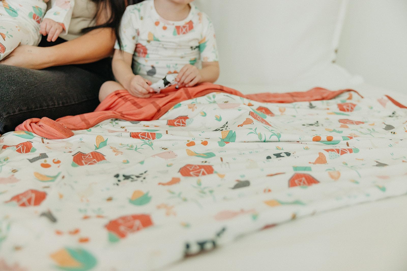 Copper Pearl soft surface detail highlights plush feel against delicate baby skin.