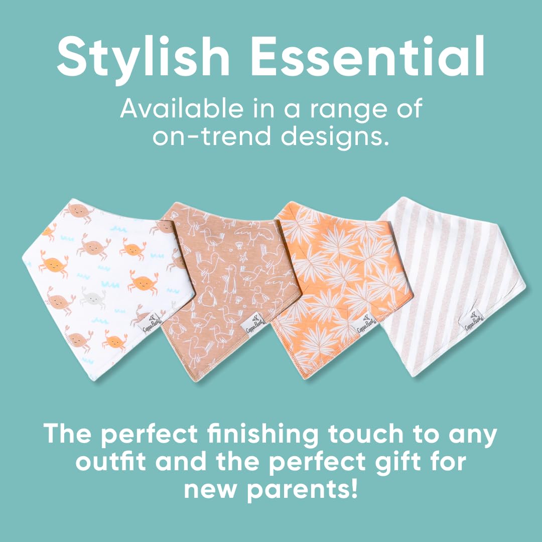 Copper Pearl Tide bibs on table with outfits, highlighting fashion-forward design