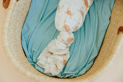 Copper Pearl Tide swaddle blanket fashion print coordinates with baby outfits