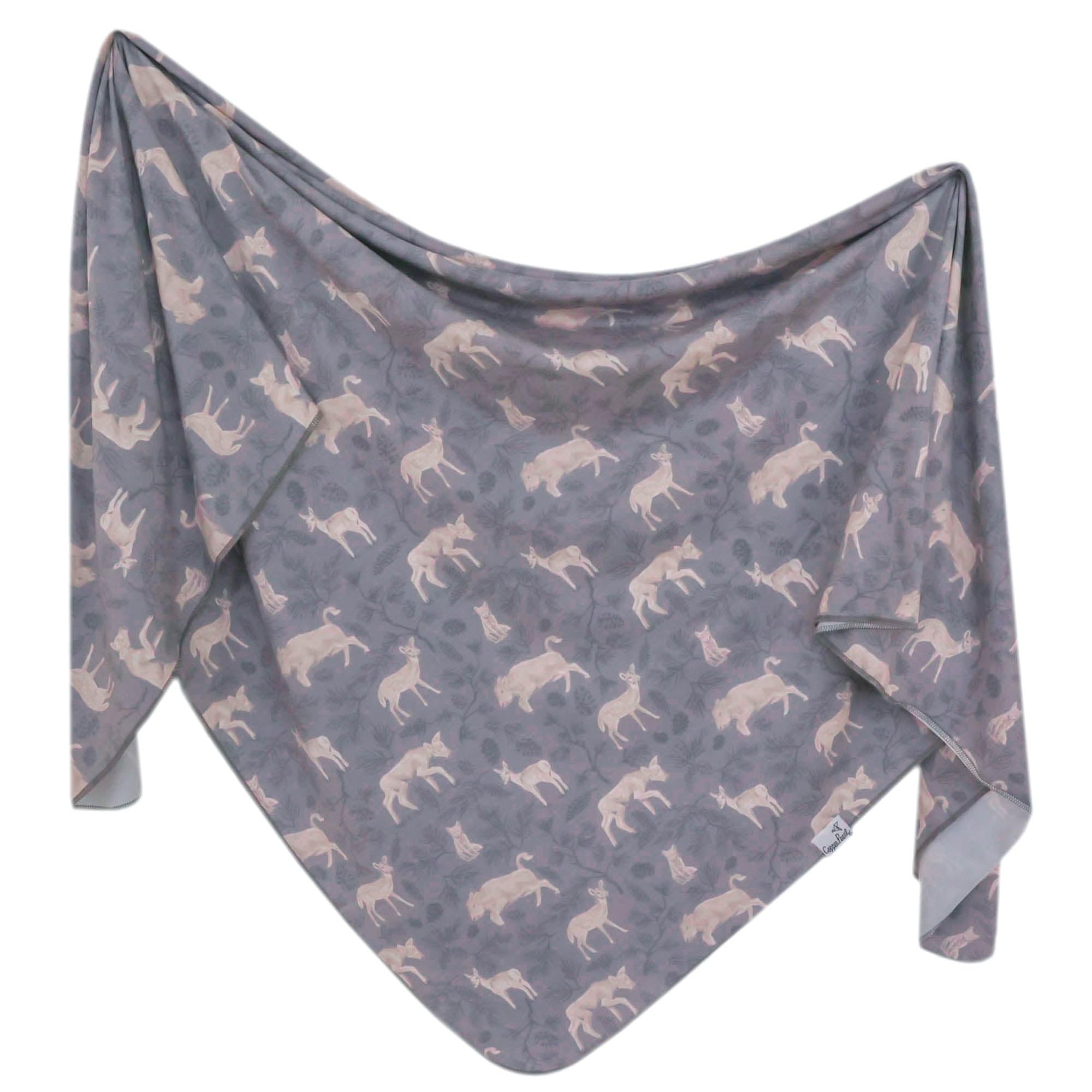 Copper Pearl Timber swaddle blanket soft knit shown for newborn warmth and breathability.