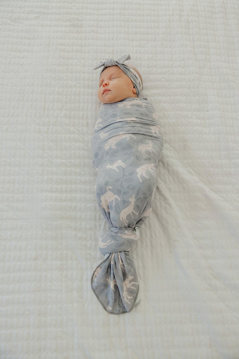 Copper Pearl Timber swaddle folded neatly demonstrating large 46x46 inch size.