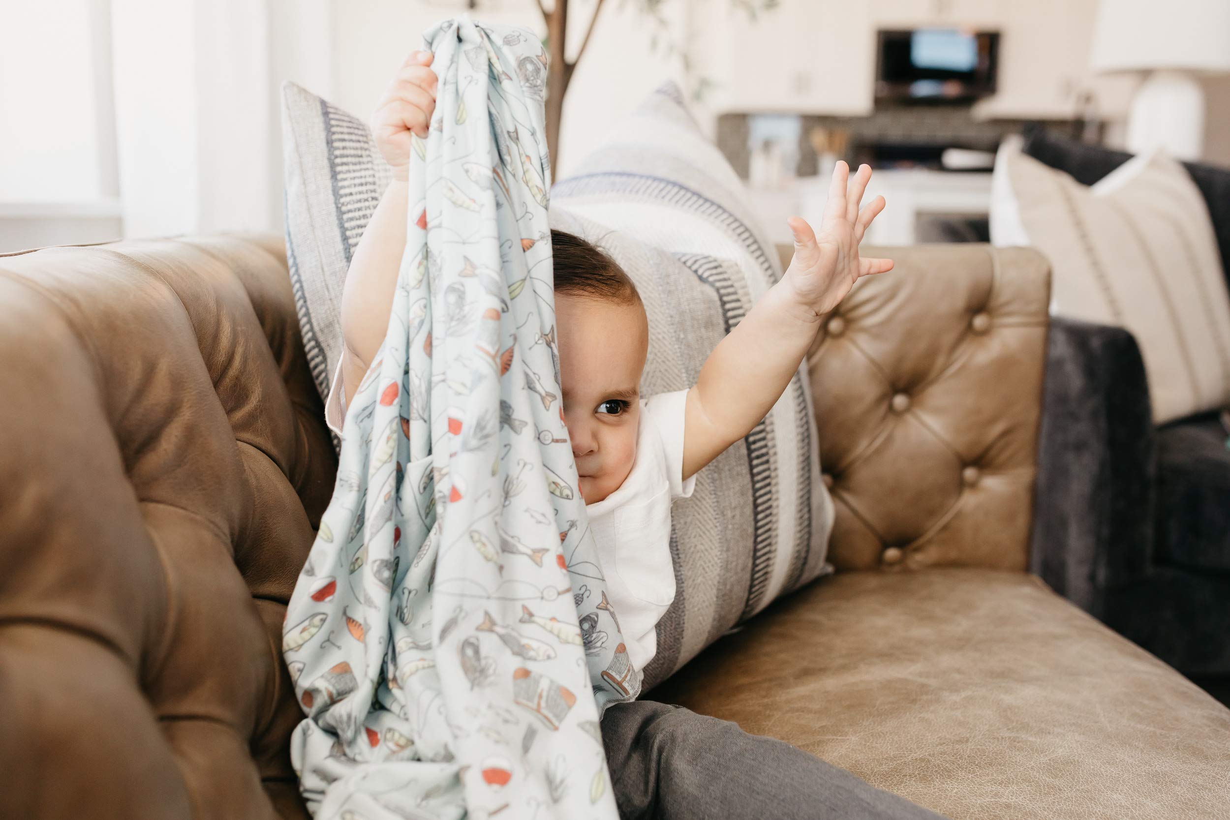 Copper Pearl Trout swaddle breathable-knit-weave emphasizes airy softness and gentle stretch.