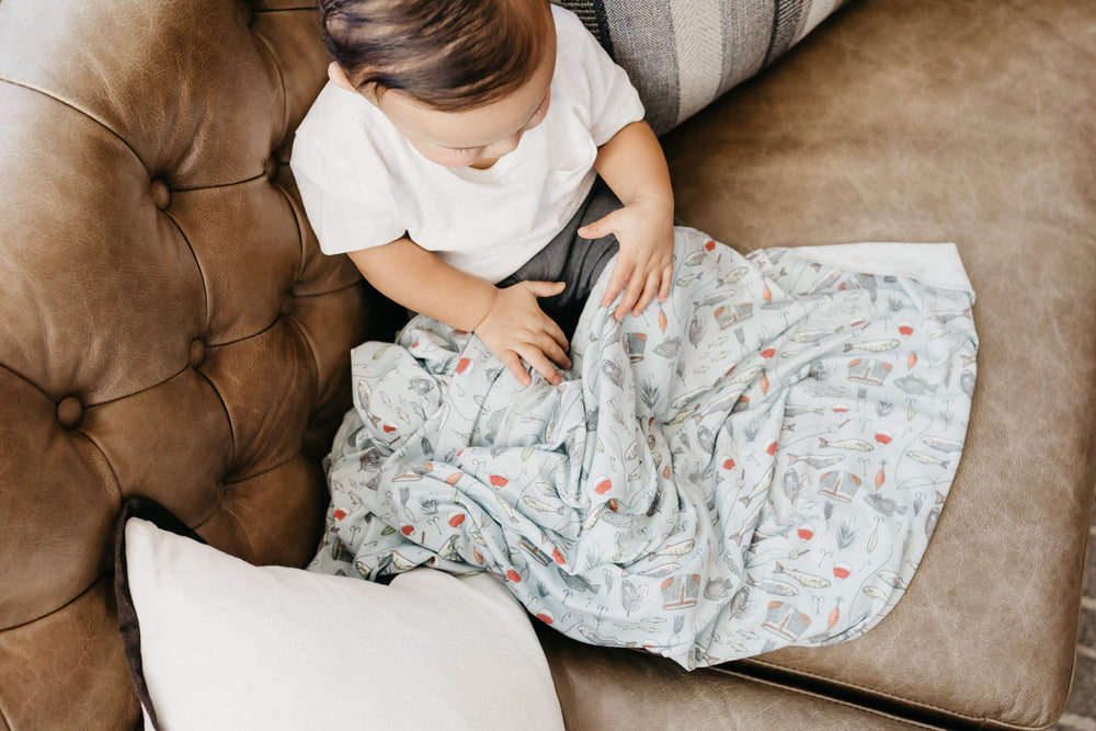 Copper Pearl Trout swaddle gift-packaging presents ready-to-gift option for new moms.