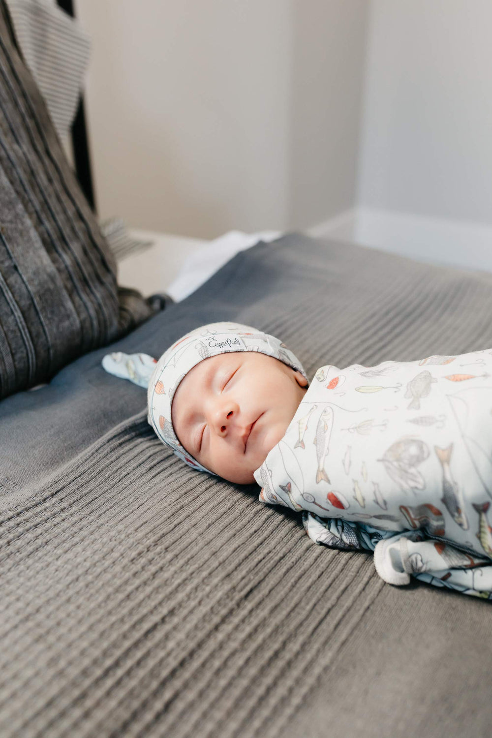 Copper Pearl Trout swaddle nursery-decor adds chic, modern accent to baby room.