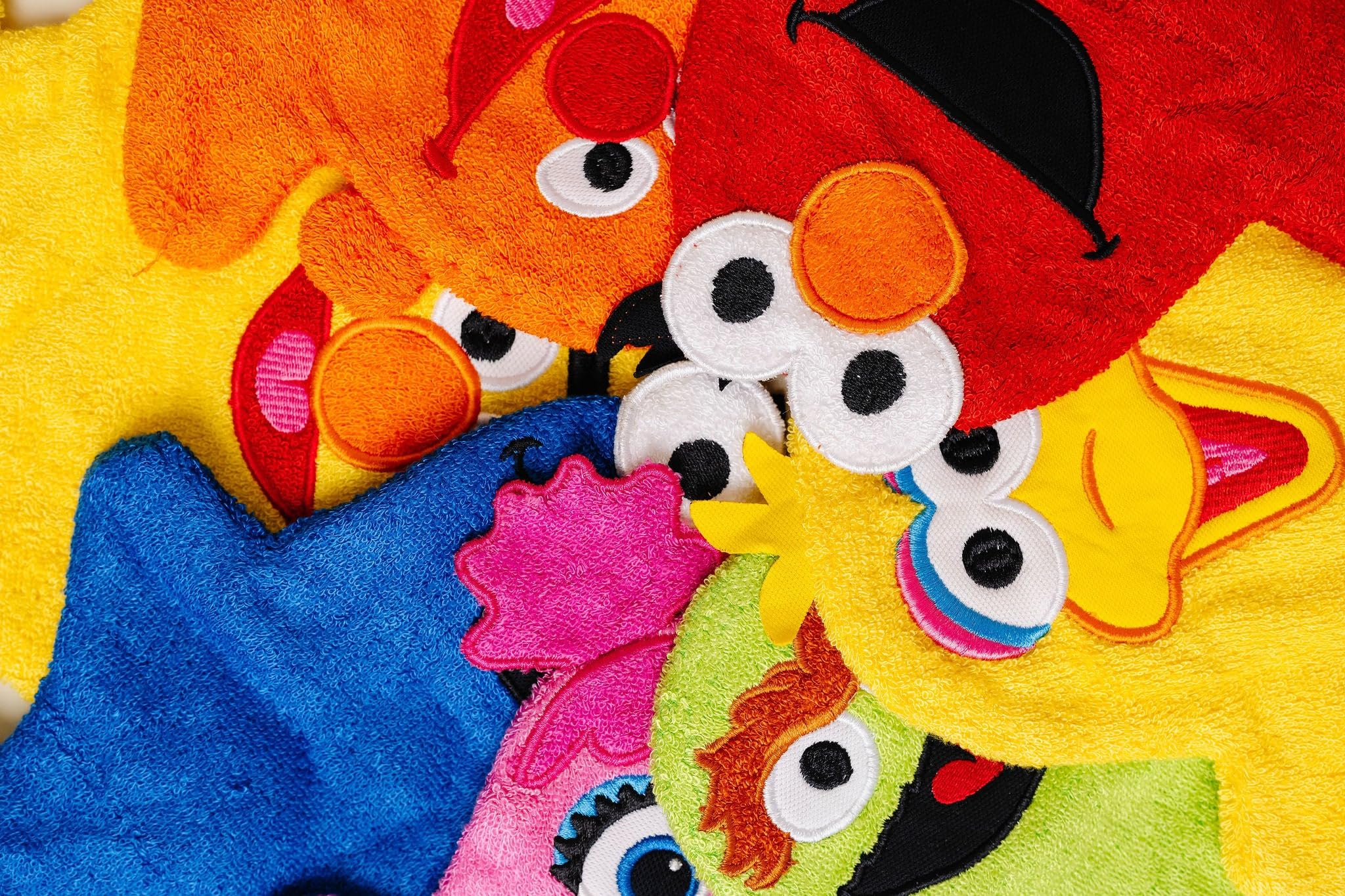 Copper Pearl wash mitt Big Bird character adds playful bath time.