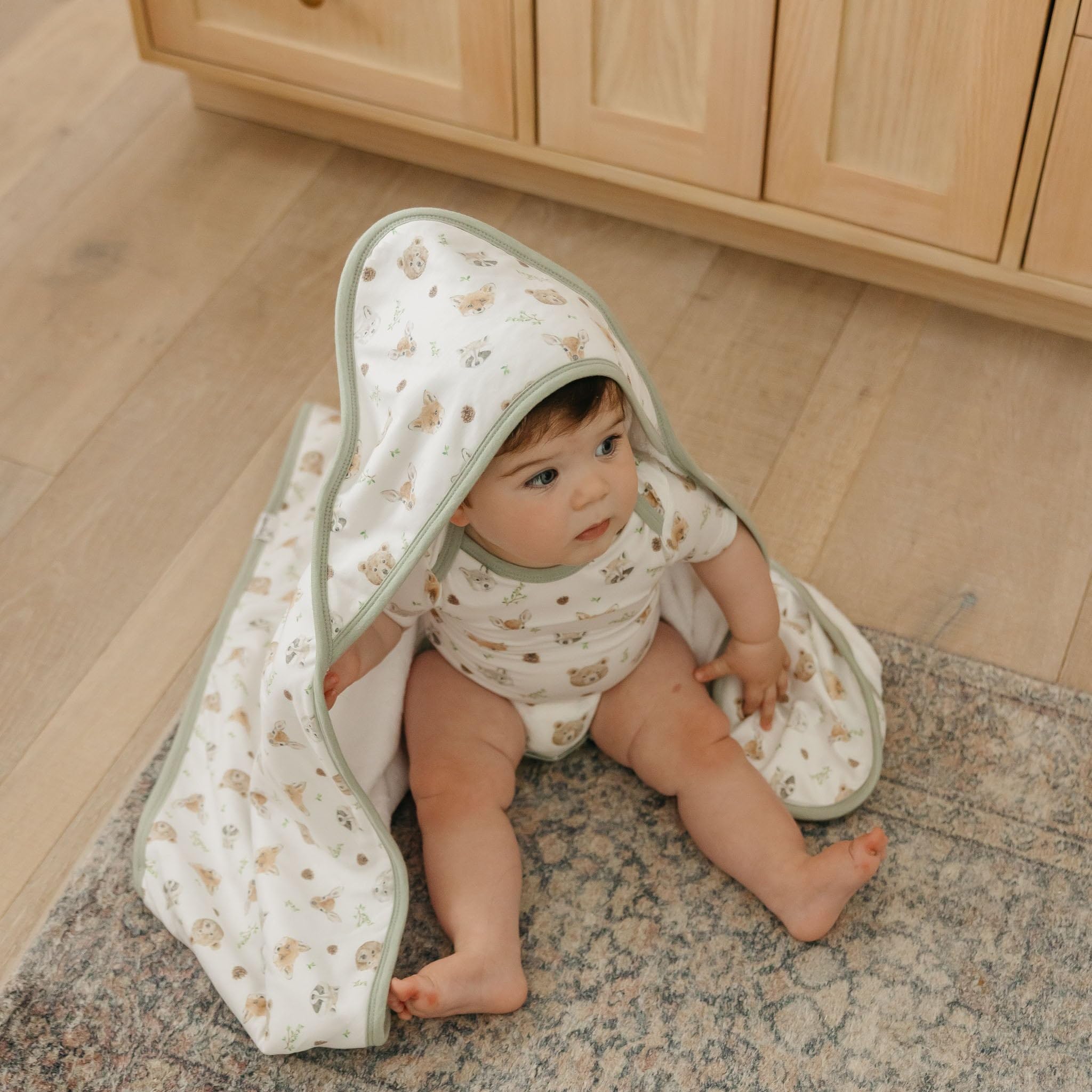 Copper Pearl Wilder hooded towel in modern print design complements nursery style