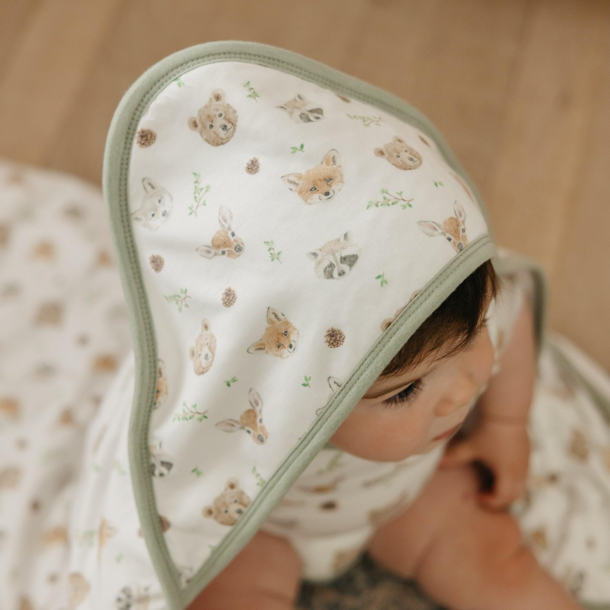 Copper Pearl Wilder towel pockets highlight warmth and tiny storage for tub time