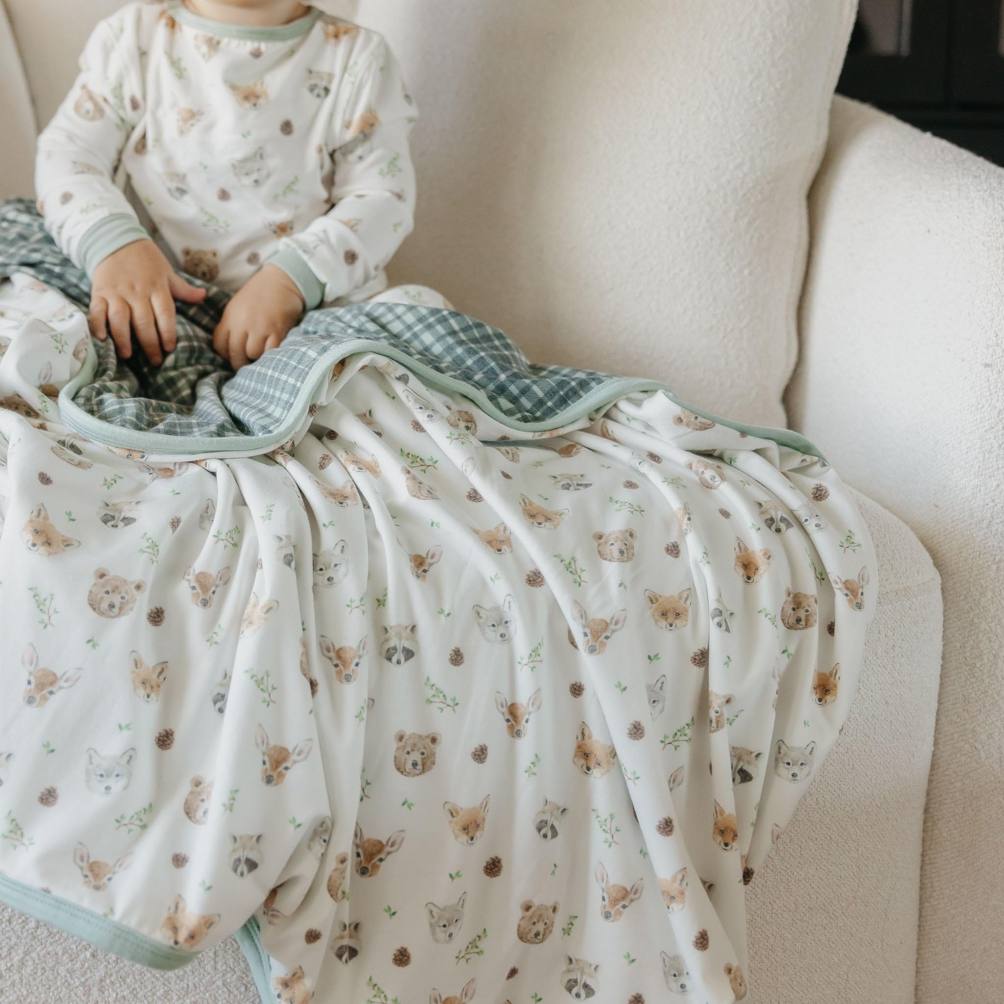 Copper Pearl Wilder blanket in use during swaddling and tummy time routines.