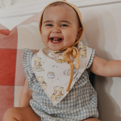 Copper Pearl Winnie Pooh bandana bib adjustable nickel-free snaps for growing babies.