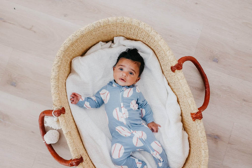 Copper Pearl zip-up footie pajama newborn 0-3 months showcases fit for early stages.