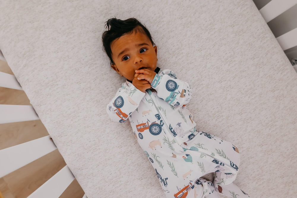 Copper Pearl zip-up footie pajamas breathable, lightweight comfort for naps.