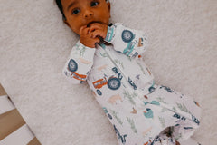 Copper Pearl zip-up footie pajamas stylish prints for coordinated baby outfits.