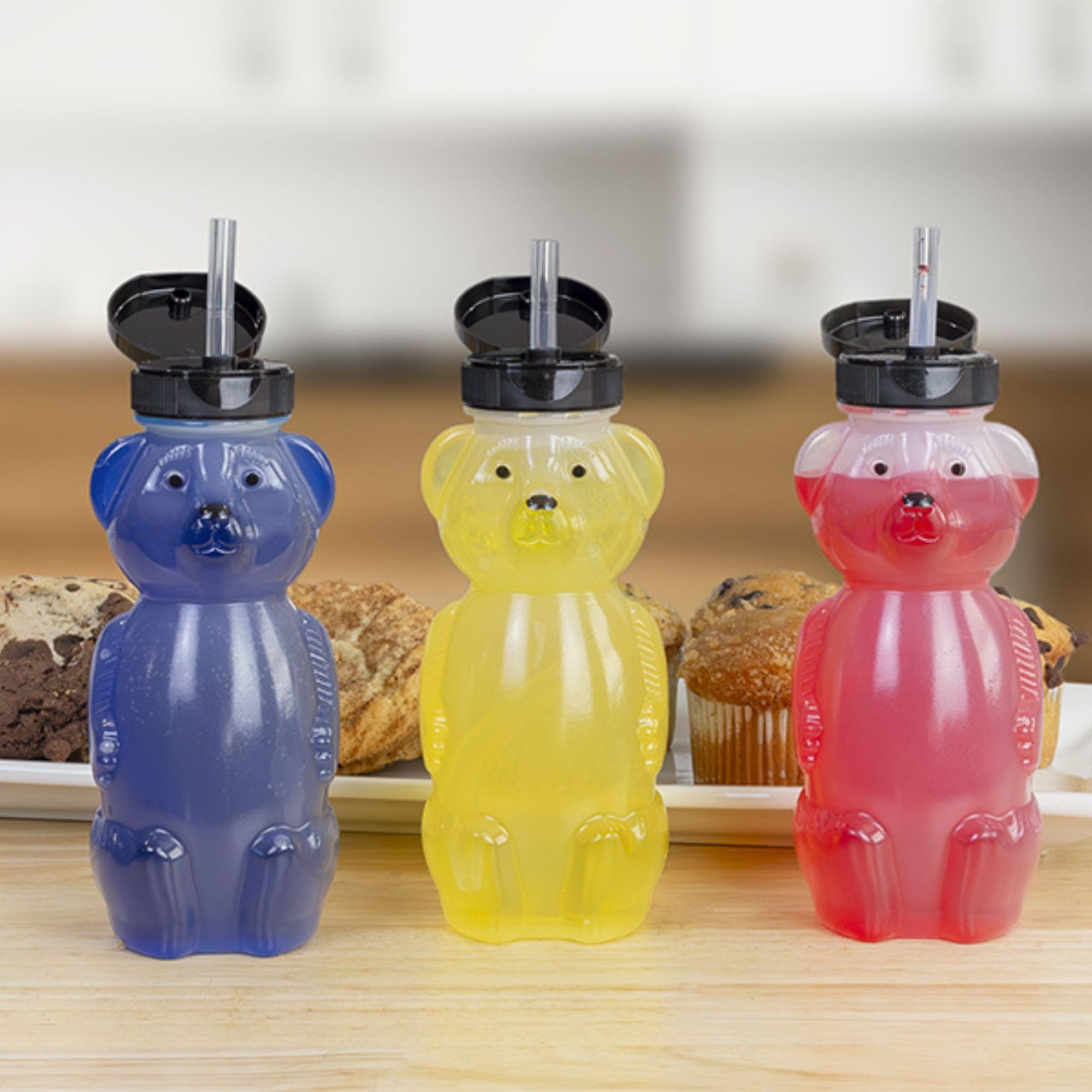 Honey Bear Straw Cup closeup showing flexible straw for tongue training