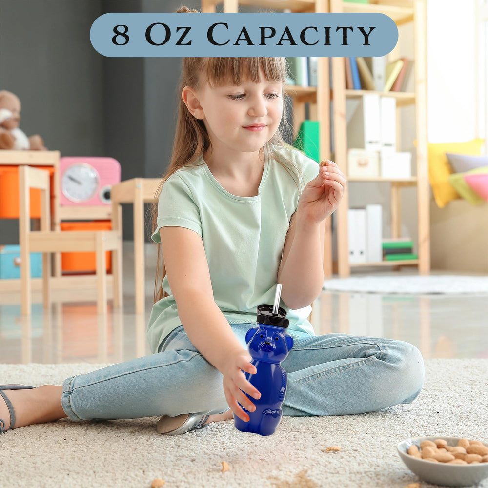 Child using Honey Bear Straw Cup during pretend play for independence