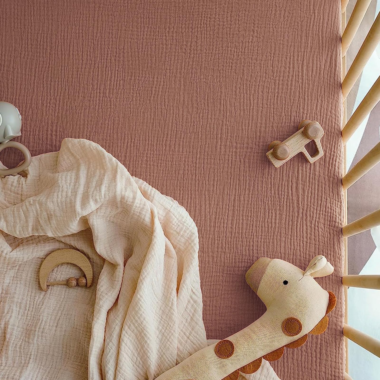 COSMOPLUS Muslin Crib Sheets on a cozy nursery setup ready for toddler bed transition.