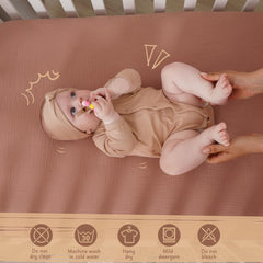 COSMOPLUS Muslin Crib Sheets in neutral boho colors suitable for daily swaps.