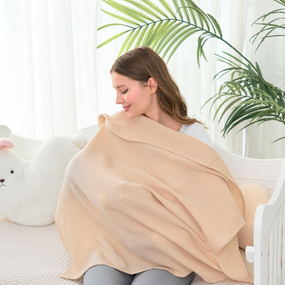 CottCare baby muslin swaddle rose pink nursery setup shows serene, gift-ready baby care.