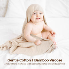 CottCare swaddle set in neutral colors demonstrates versatile uses like nursing covers.