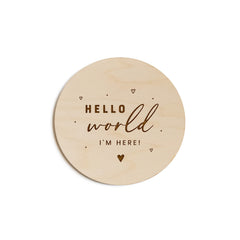 The Cotton and Canvas Co. Hello World disc full shot — timeless newborn keepsake for photos.