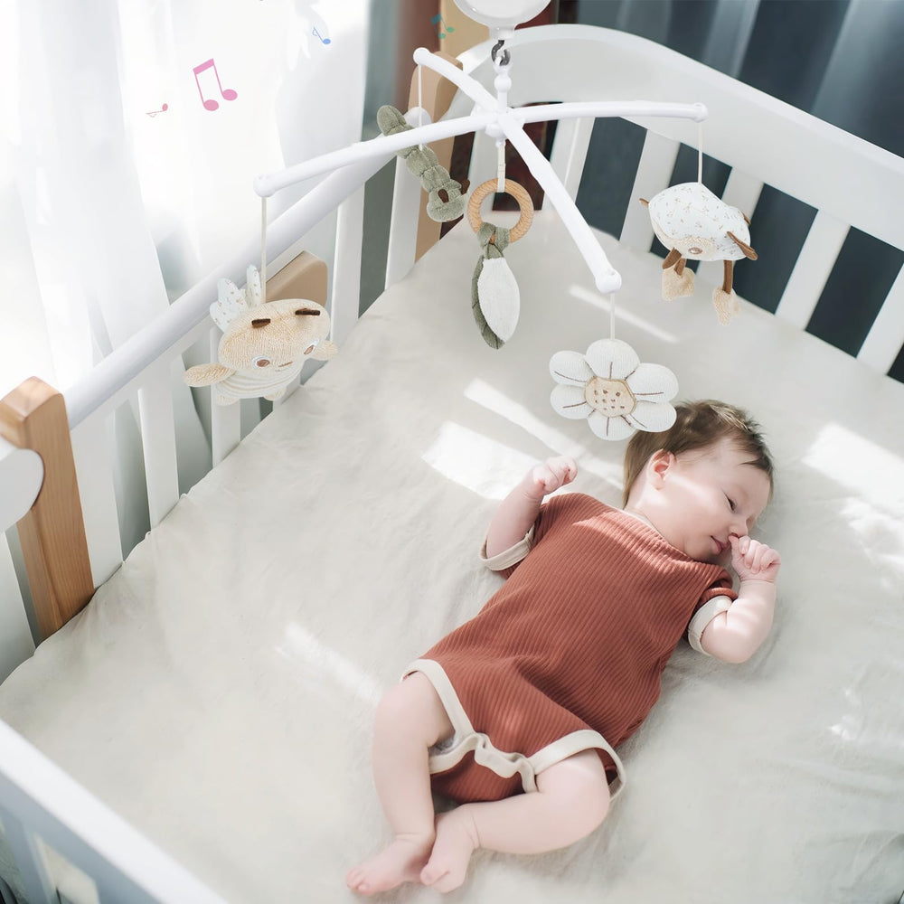 COTTONBEBE crib mobile installs quickly with pre-attached arm for easy setup.