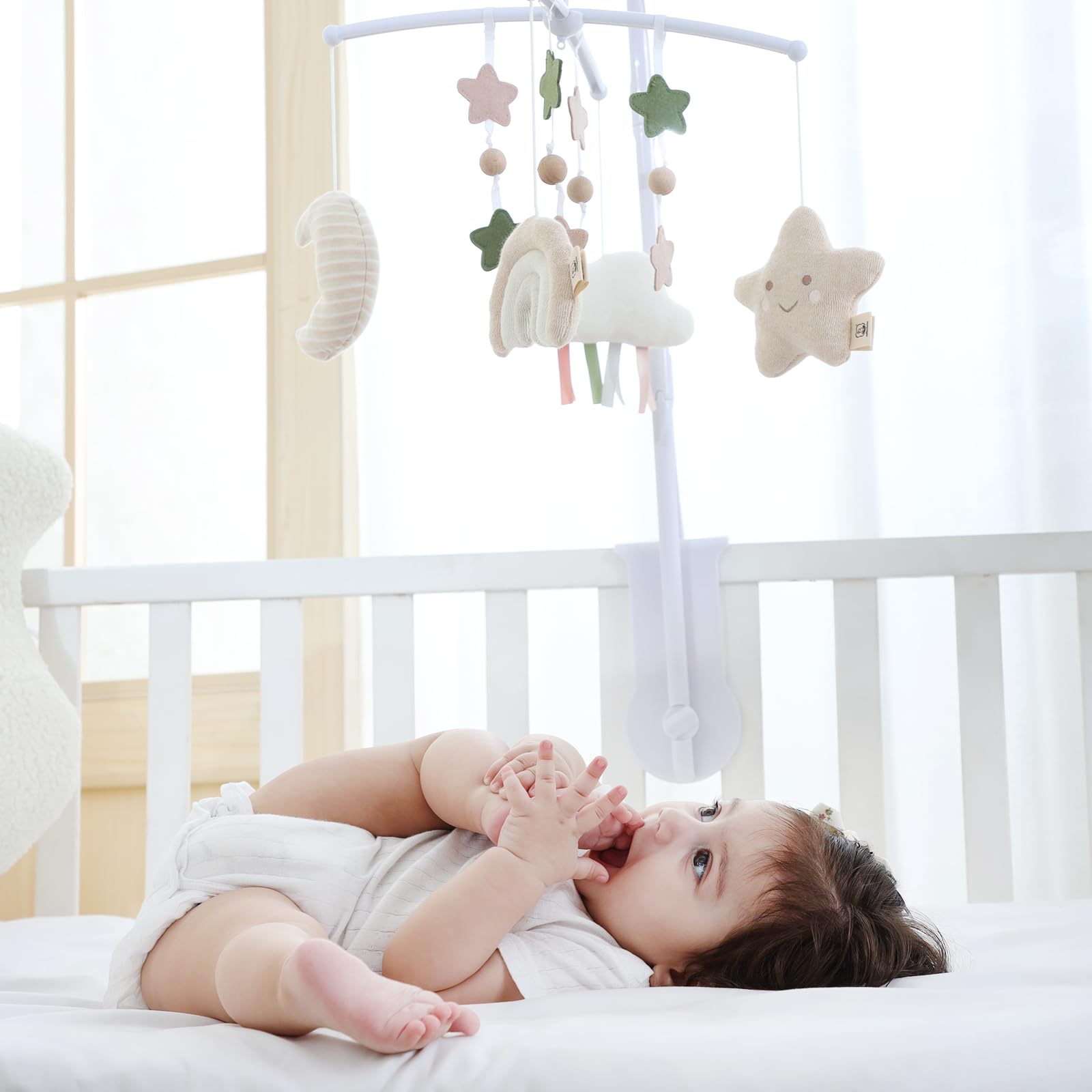 COTTONBEBE crib mobile lullaby music offers calm bedtime options.