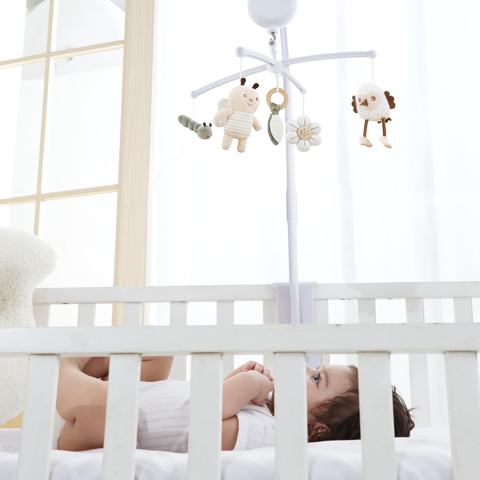 COTTONBEBE crib mobile musical lullabies provide calm before sleep.