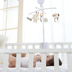 COTTONBEBE crib mobile musical lullabies provide calm before sleep.