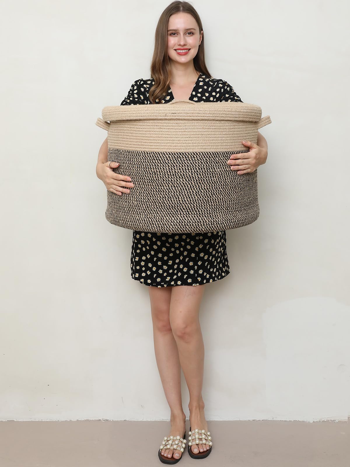Cottonphant basket open lid reveals hidden storage for clothes and towels.