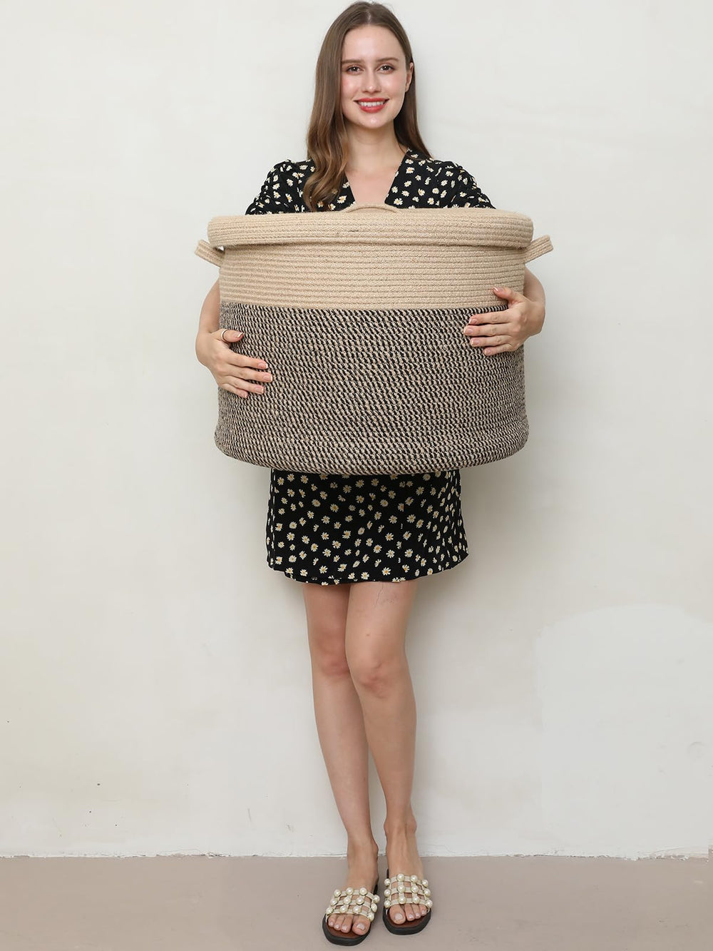 Cottonphant basket open lid reveals hidden storage for clothes and towels.