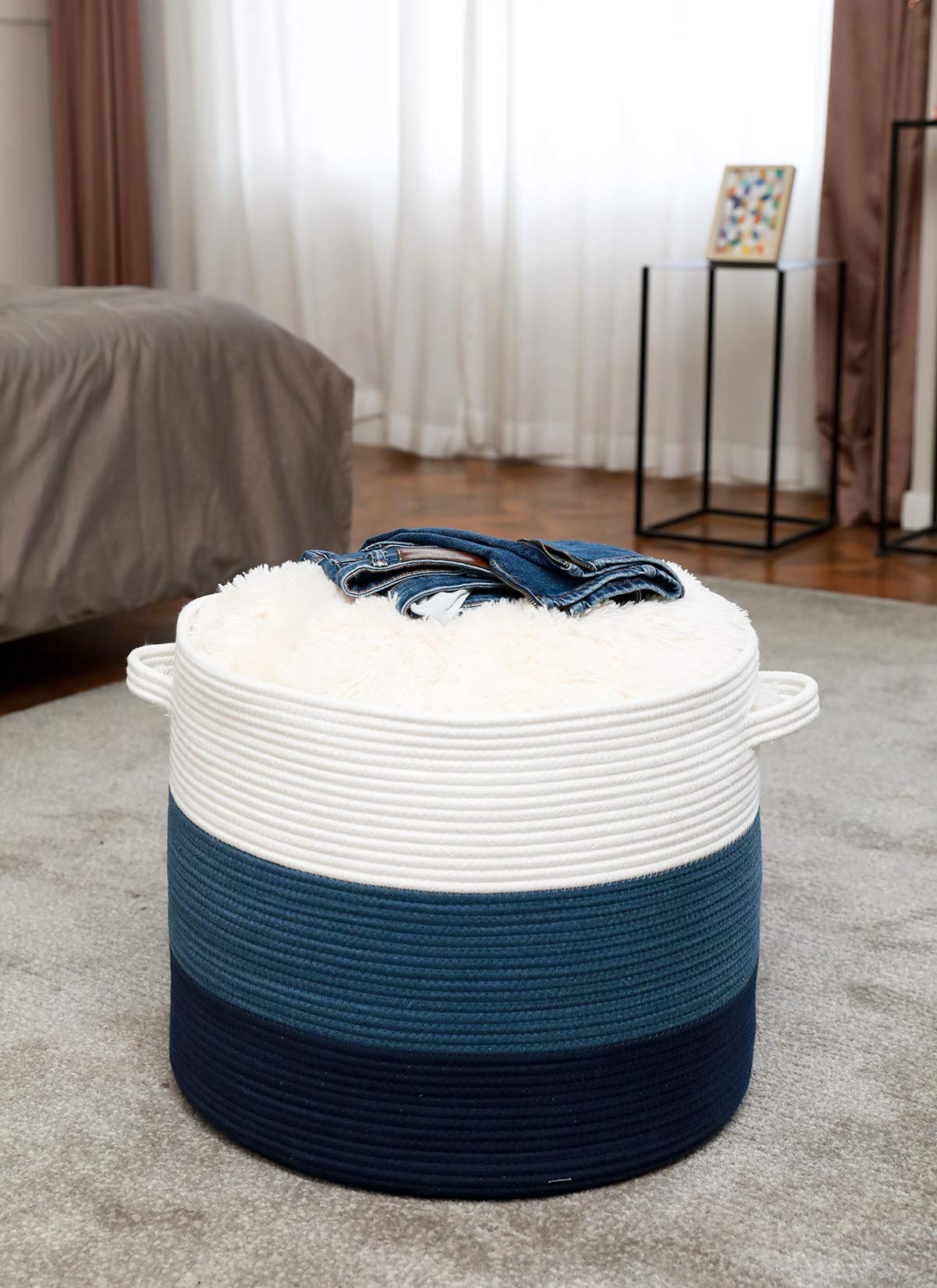 Cottonphant versatile laundry hamper doubles as decorative bedroom storage.