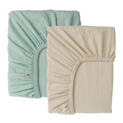 Cottonsis muslin baby crib sheet folded vanilla ice cream showcases soft, breathable Turkish cotton for safe sleep.
