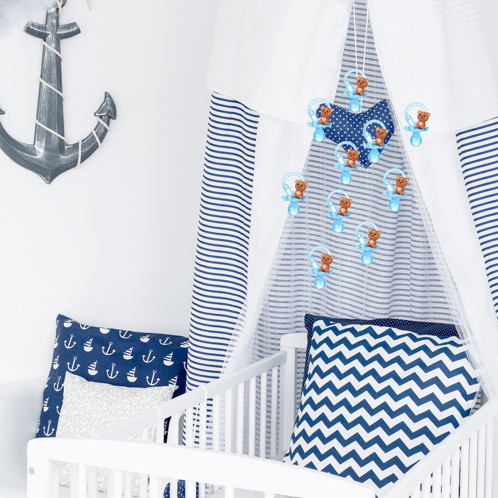 Coume guest favors blue pacifier necklace used as party token