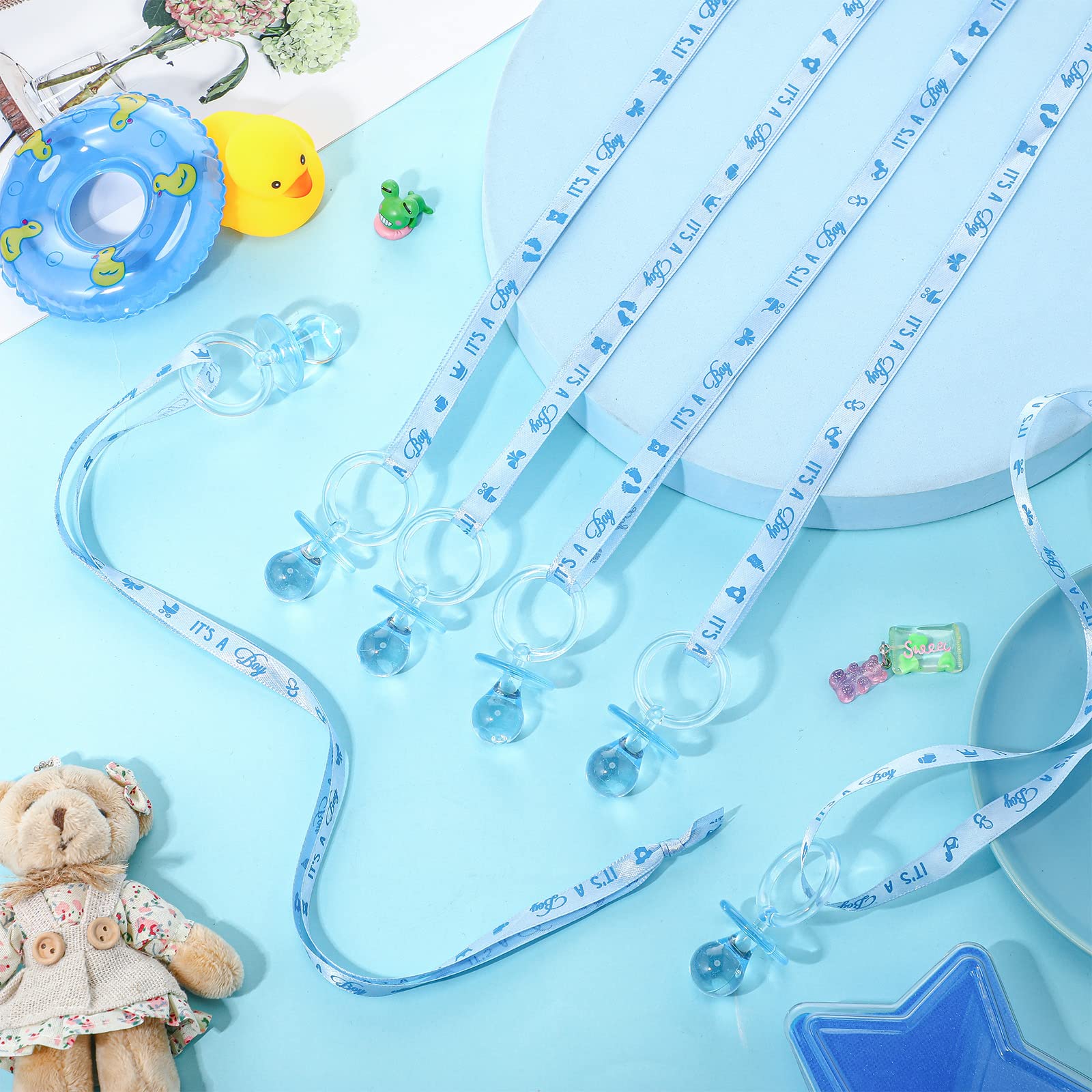 Coume party-favor pacifier necklace wearable for guests.
