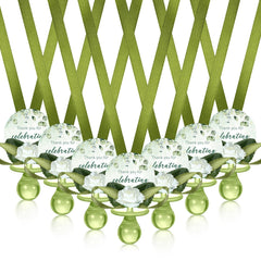 Coume sage-green pacifier necklace closeup — lightweight wearable favor.