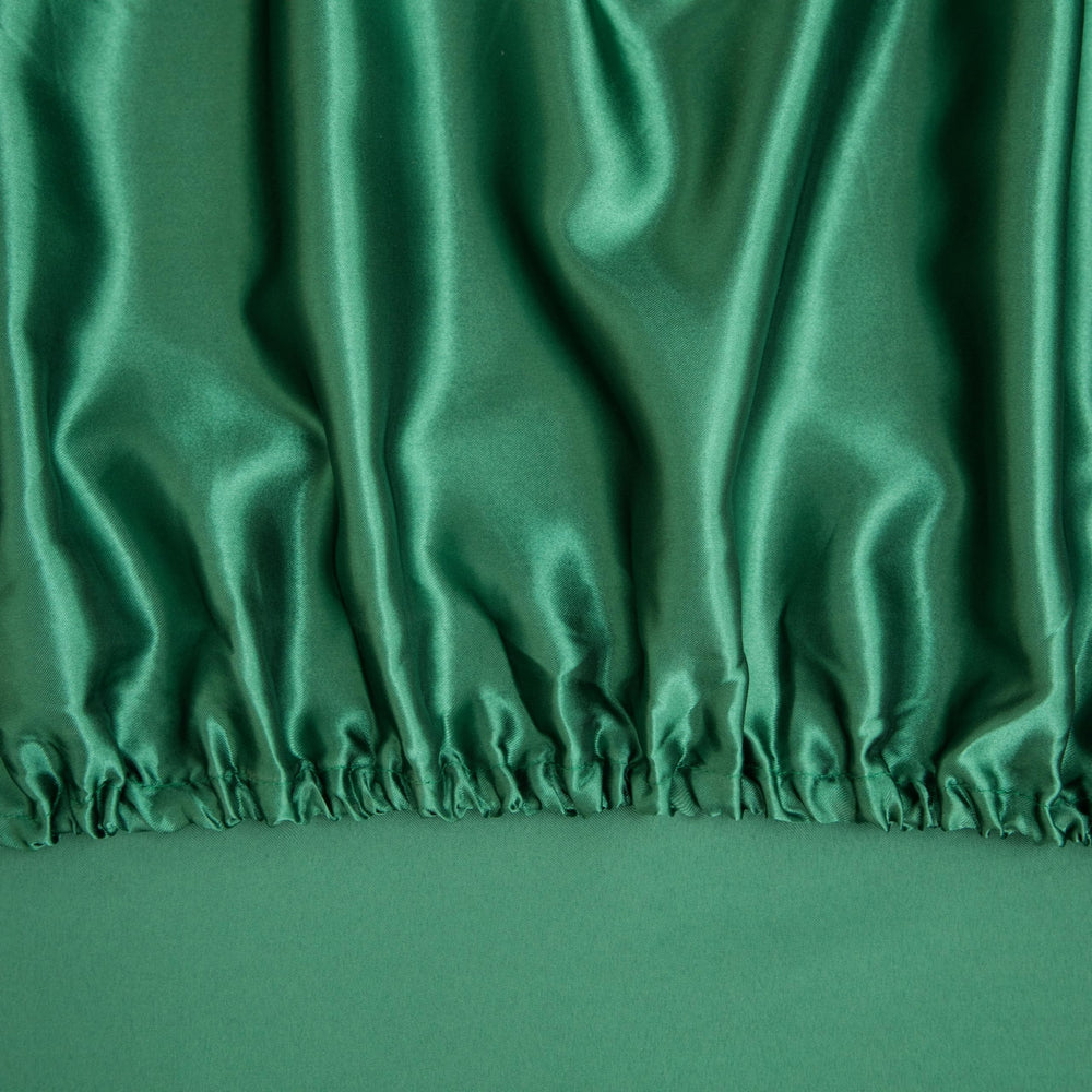 Counfeisly silk satin crib sheet features breathable fabric suitable for year-round comfort.