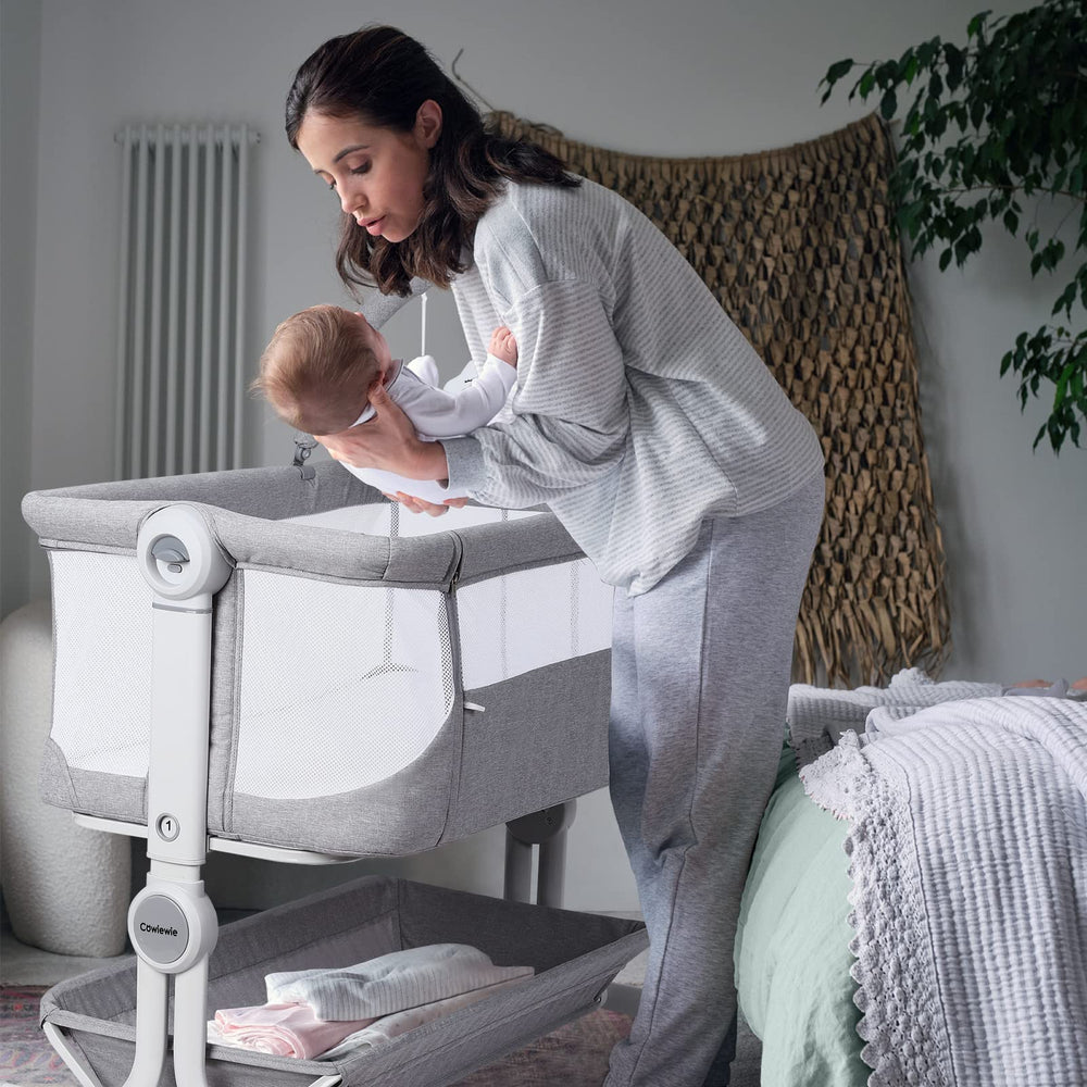 Cowiewie Baby Bassinet cartoon toys promote visual engagement for baby.