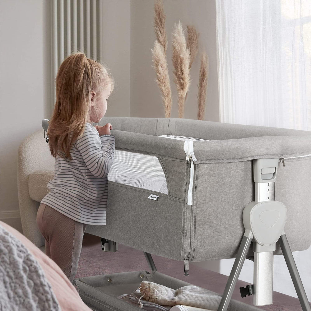 Cowiewie Bassinet Bedside Sleeper folded design for travel or storage.
