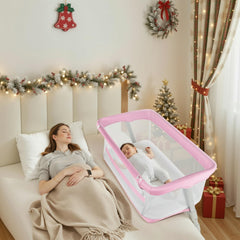 Cowiewie Bassinet bedside-sleeper with height adjustment for easy night feeds.