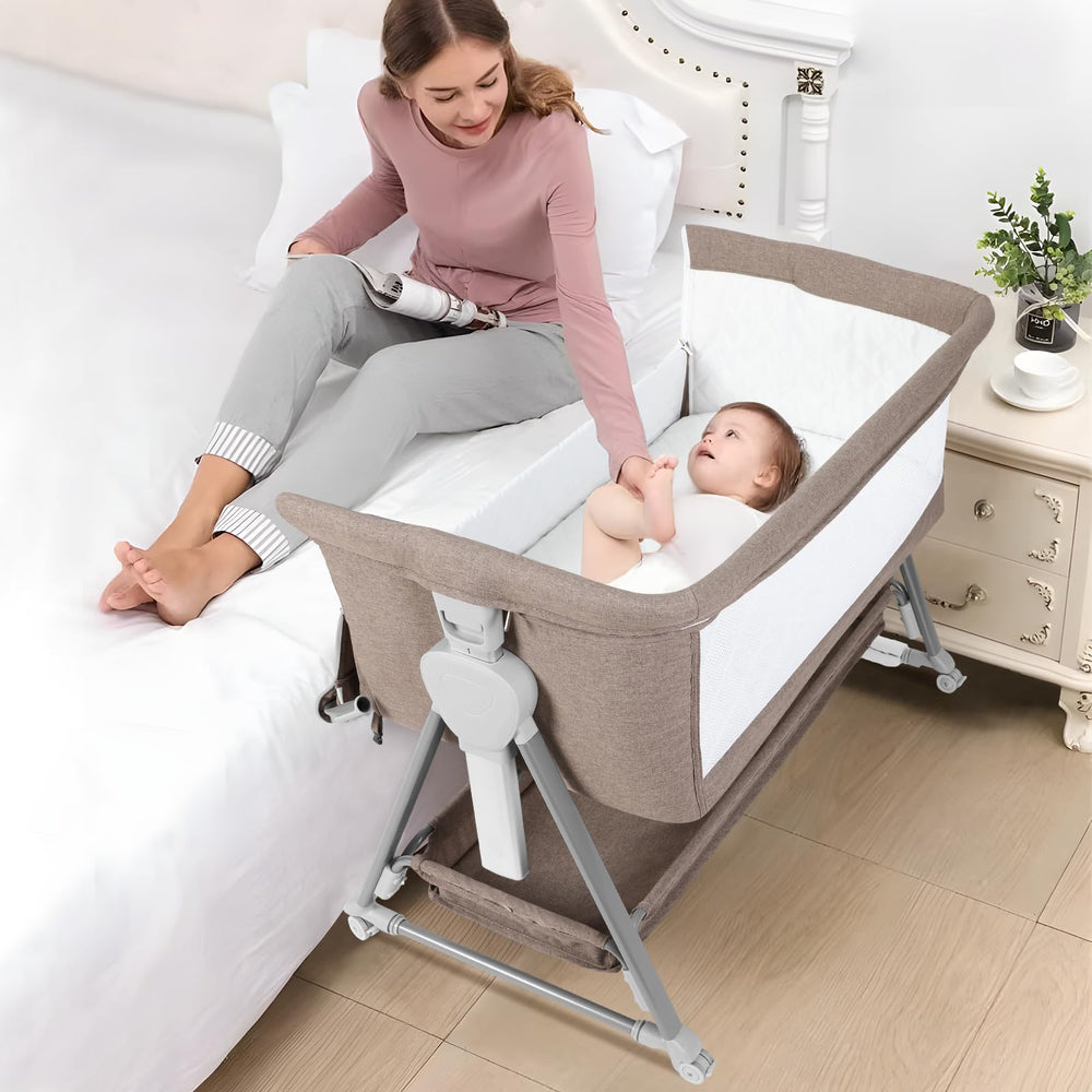 Cowiewie Bassinet Bedside Sleeper pyramid base with silent wheels for smooth nightly moves.