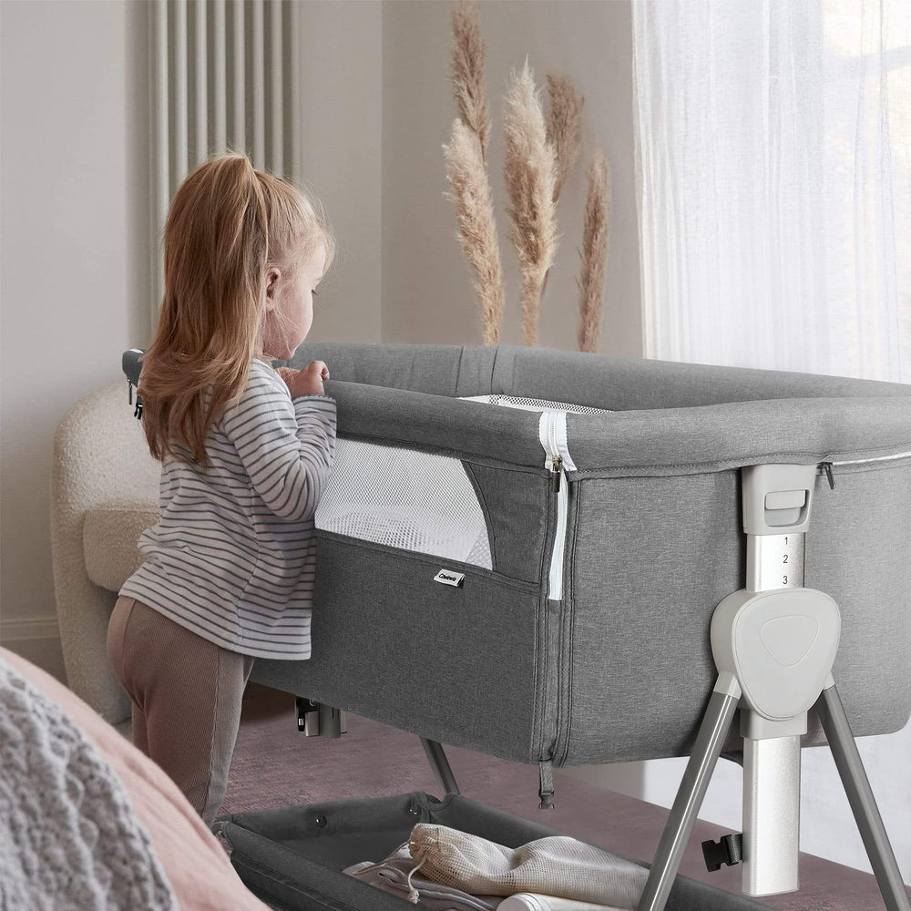 Cowiewie pyramid bassinet promotes independent sleep with a dedicated baby zone.