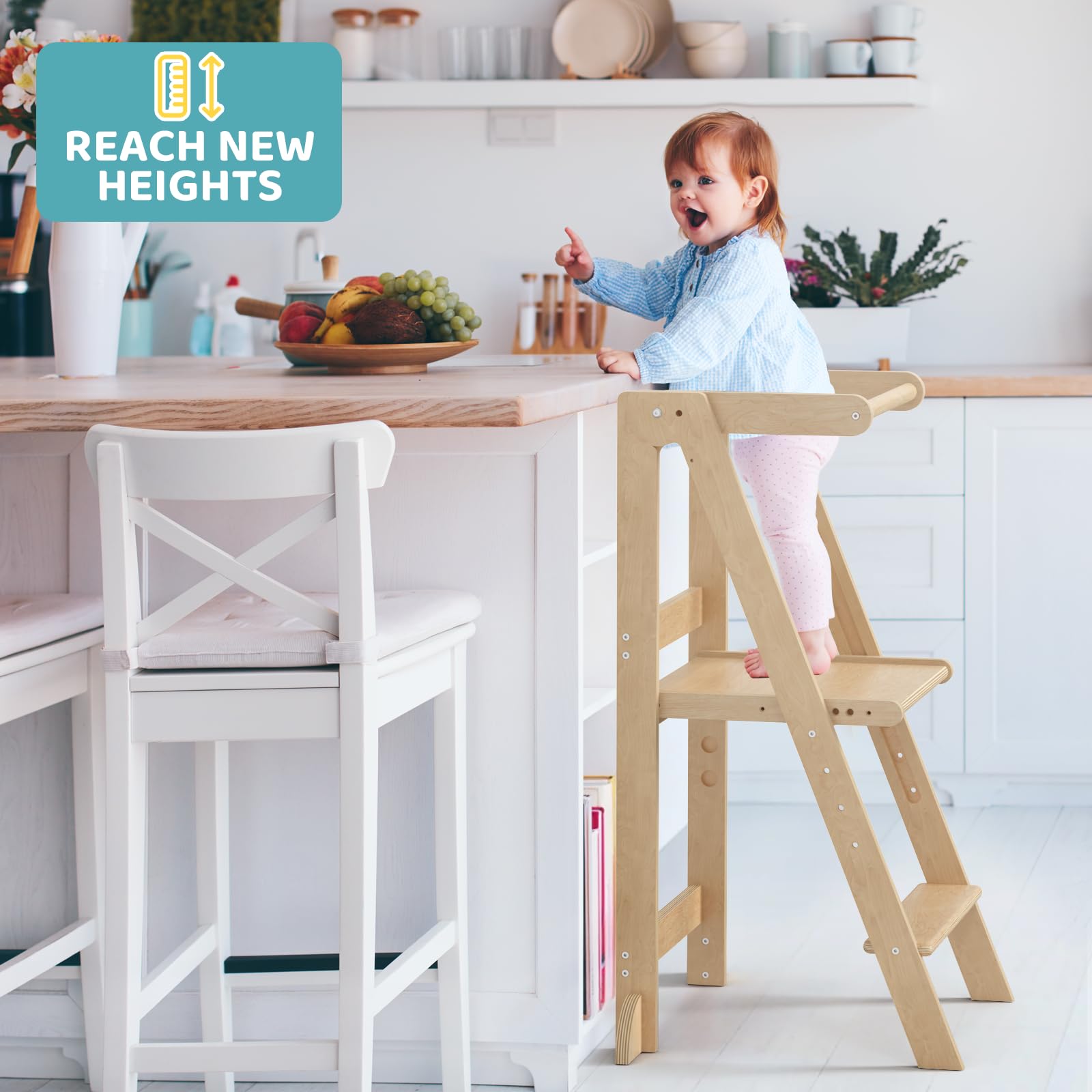 Cowiewie Foldable Toddler Tower showing armrest lock for safety.