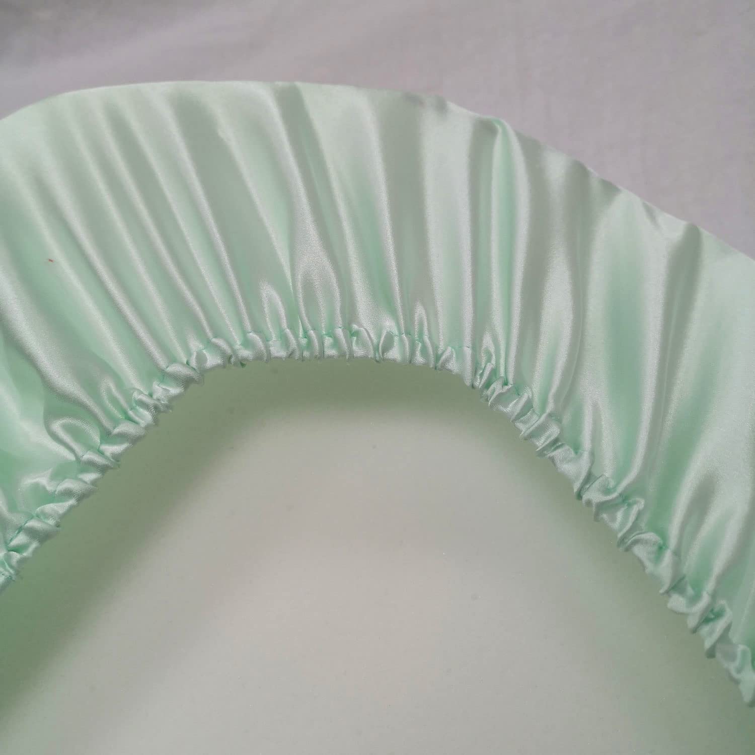 Cozysilk secure-elastic bassinet sheet fits snugly to prevent slipping during naps.