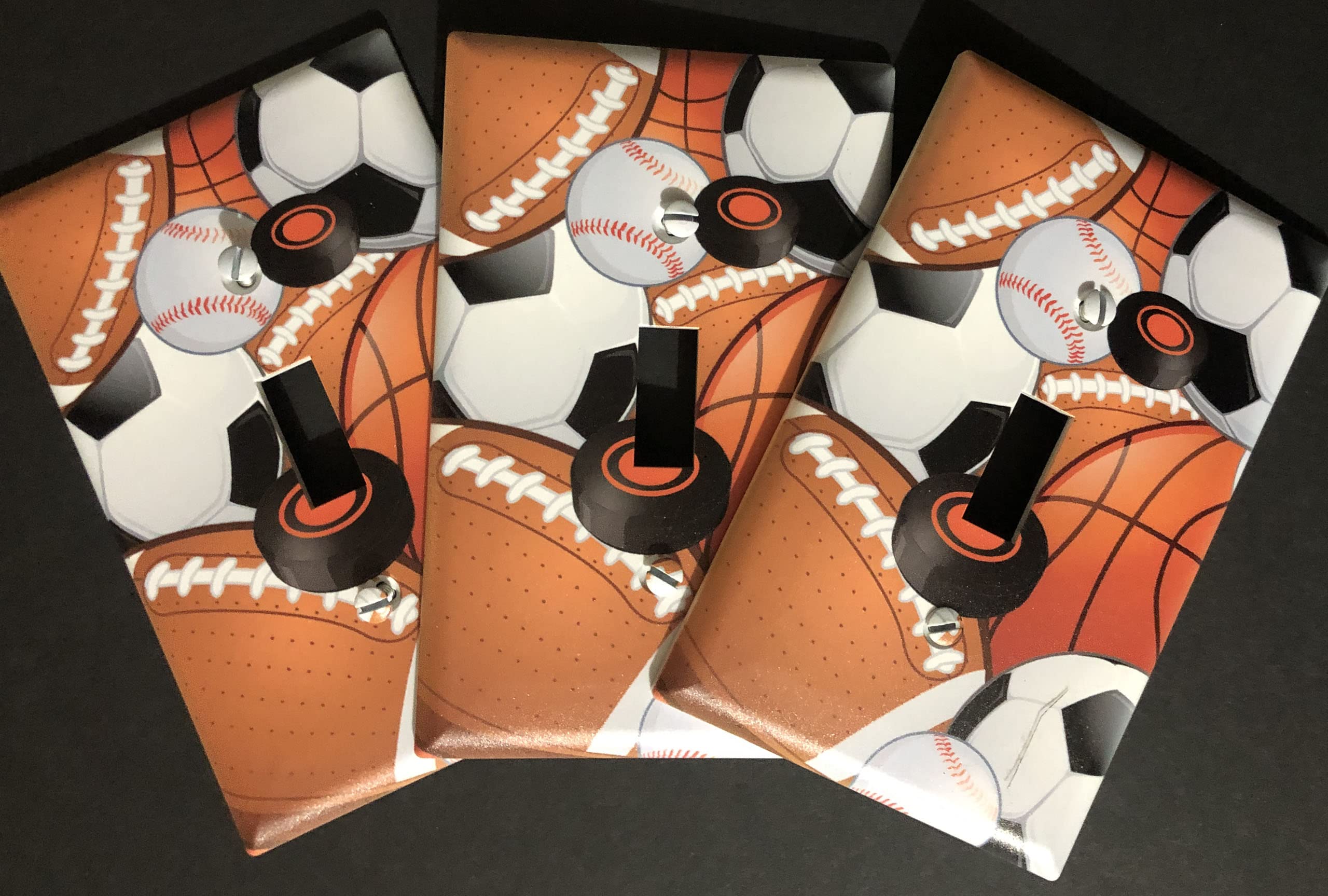 Create-A-Mural basketball switch cover brightens kid's room with dynamic team-inspired design.