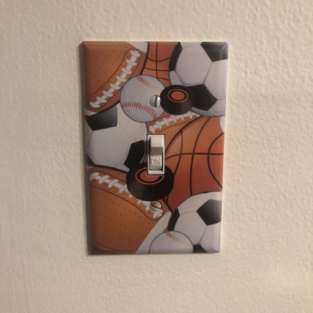 Create-A-Mural football switch cover adds bold color and sports theme to a teen room.